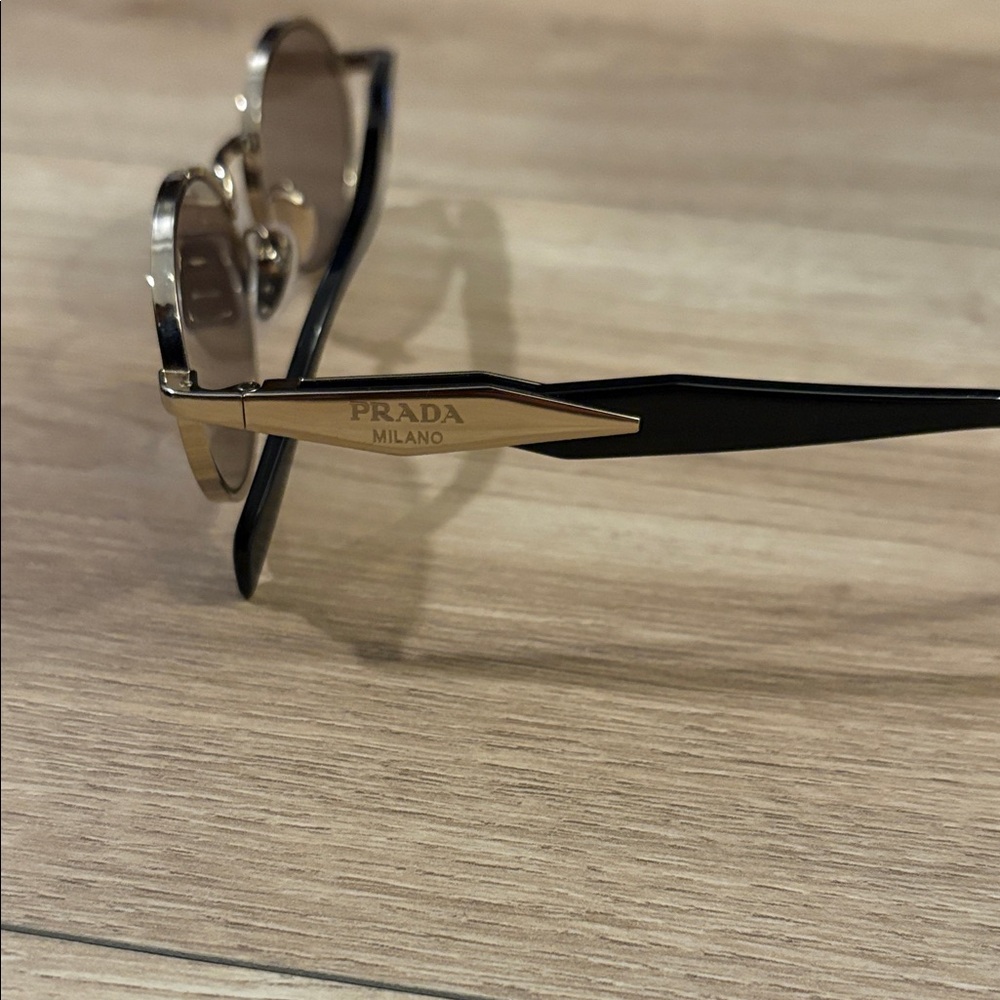 Prada Oval Black and Gold Sunglasses - Picture 4 of 4